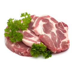 Raw pork neck chop meat with parsley herb leaves garnish isolated on white background cutout