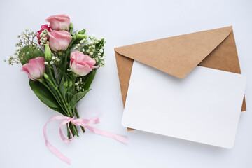 greeting card design. beautiful bouquet of flowers, gift box and envelope with white blank for text 