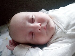 a baby is sleeping and dreaming
