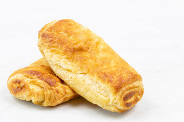 Pastries with cheese on the white background