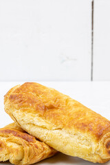 Pastries with cheese on the white background