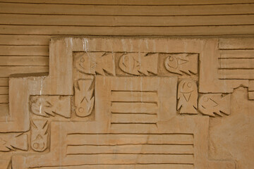 Beautiful carvings at the ancient ruins of Chan Chan, Trujillo, Peru