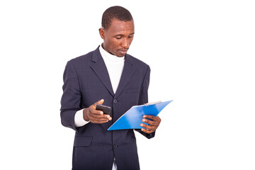 portrait of a handsome businessman with notepad and cellphone.portrait of a handsome businessman with notepad and cellphone.