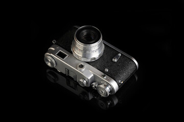 The very rare old rangefinder film camera on black background.
