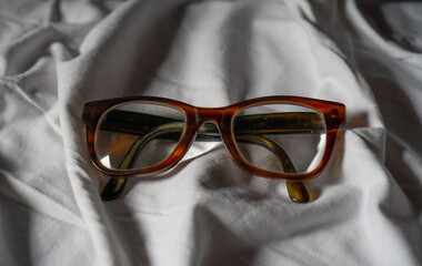 beautiful old glasses in a white surface