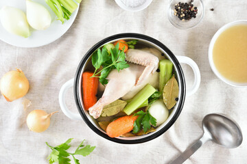 Chicken broth with vegetables and spices