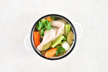 Chicken broth with vegetables and spices