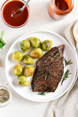 Grilled beef steak with brussels sprouts