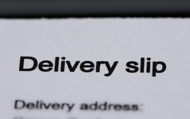 Macro shot of a delivery slip's title section