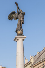 Fototapeta na wymiar Angel of Uzupis Bronze monument in artistic neighborhood of Vilnius, Lithuania.