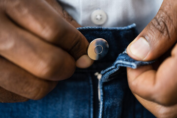 Man Opening Jeans Zipper To Masturbate