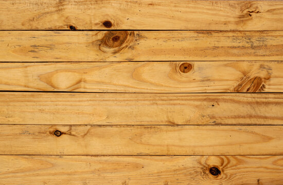 Yellow pinus wood table background, lots of contrast, wooden texture
