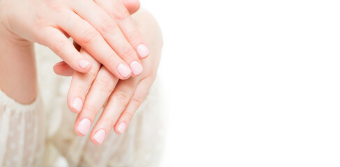 Womans hands with beautiful manicure on white background. Closeup shot of female hands with beautiful manicure. Copy space