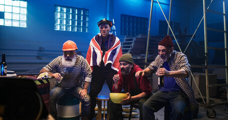 Excited men celebrating Great Britain victory