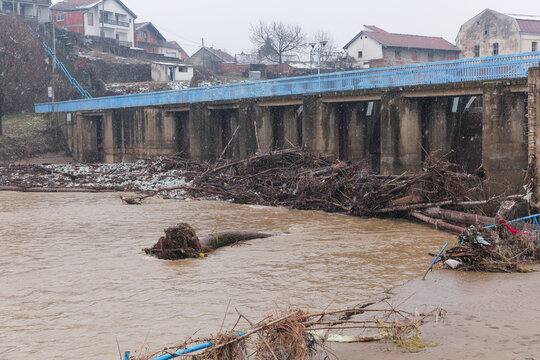River after flood with plastic and wood pollution . Vlasina river, Serbia. Ecology problem.