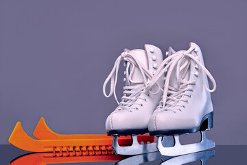 women's skates . winter sports . white shoes for figure skaters . taken in close-up