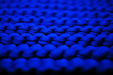 ultramarine blue background large knitted thread pattern