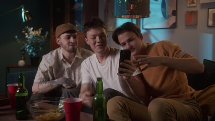 Diverse international friends celebration birthday toasting on video chat call, students Christmas celebration online during coronavirus lockdown, mens party with beer and football. - Powered by Adobe