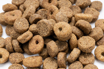 domestic animals dry food isolated on white background. dry cat feed cut out. above view