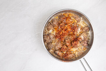 Fried Chicken Liver in the frying pan