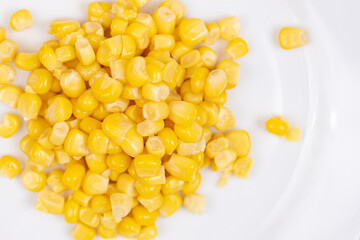 Cooked Sweet Corn above white background