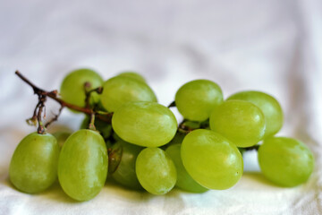 Bunch of green grapes isolated on white