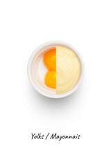 Mayonnaise and yolks in a white bowl, isolated on white