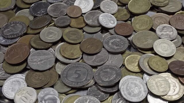Lots of coins from different countries, some of which no longer exist