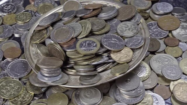 Lots of coins from different countries, some of which no longer exist