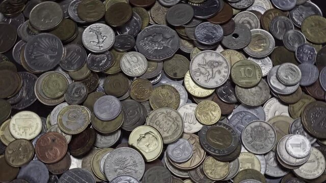 Lots of coins from different countries, some of which no longer exist