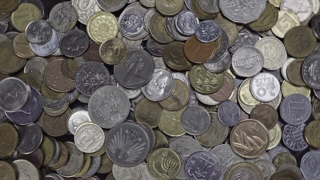 Lots of coins from different countries, some of which no longer exist