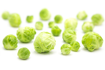 Fresh organic brussels sprouts isolated on white background.