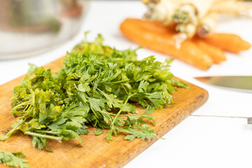 Fresh Parsley on the wooden cutting board
