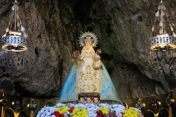 Virgin of Covadonga in in the rocky cave. Asturias. Spain 