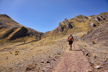 Fototapeta premium Trekking part of the original Inca Trail to the ruins of Huchuy Qosqo, Sacred Valley, Peru