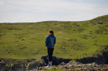 person walking in the mountains