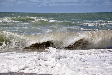waves crashing on the beach