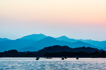 China, Zhejiang, Hangzhou. West Lake sunset.