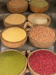 Vietnam, Hanoi, Old Quarter. A variety of legumes including peas and beans for sale.