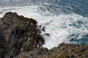 waves crashing on rocks