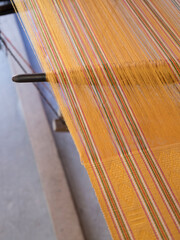 Vietnam, Phan Thiet. Close-up of weaving on a loom.
