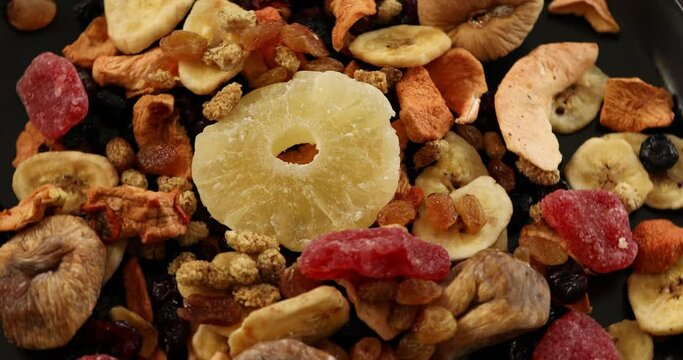 A mix of healthy dried fruits rotating
