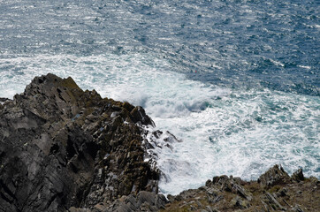 waves crashing on rocks