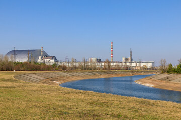 Ukraine, Pripyat, Chernobyl. Reactor 4 covered by the new containment sarcophagus completed in 2017.