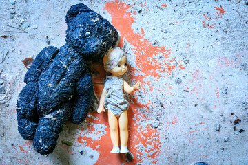 Ukraine, Pripyat, Chernobyl. Toys in the kindergarten. A badly burned teddy bear and a doll.