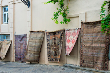 Selling carpets on the street in the Inner City of Baku, Azerbaijan