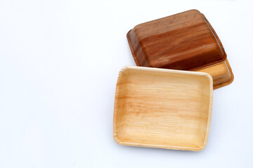Betel palm leaf plate on white background.