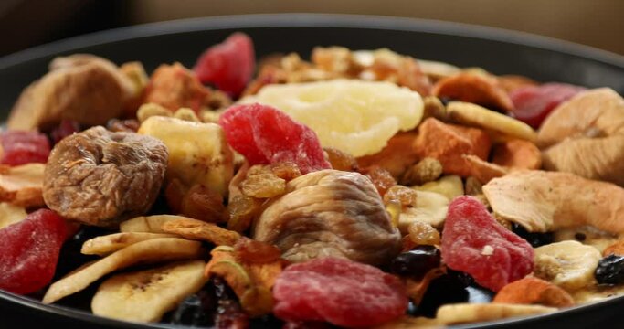 A mix of healthy dried fruits rotating