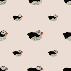 Minimalistic seamless pattern with hand drawn puffin arctic ornament elements. Pastel background.