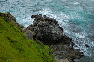 The beautiful blue waves of the beach in Gunungkidul